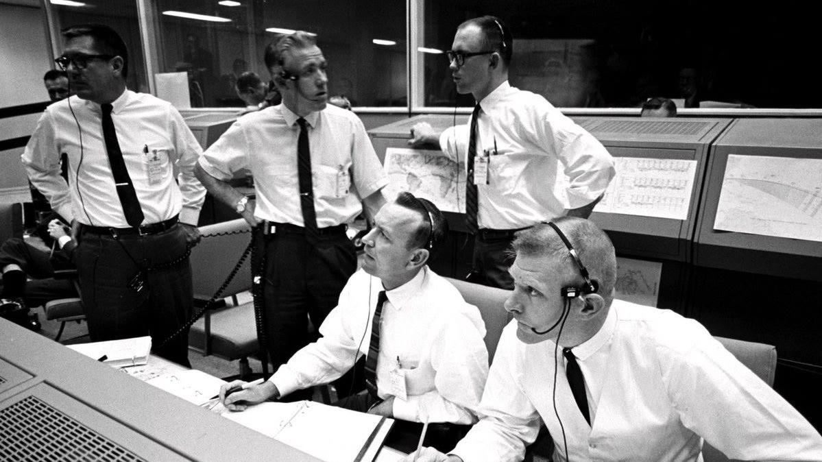 NASA flight controllers in Mission Control during the Apollo 13 mission in 1970